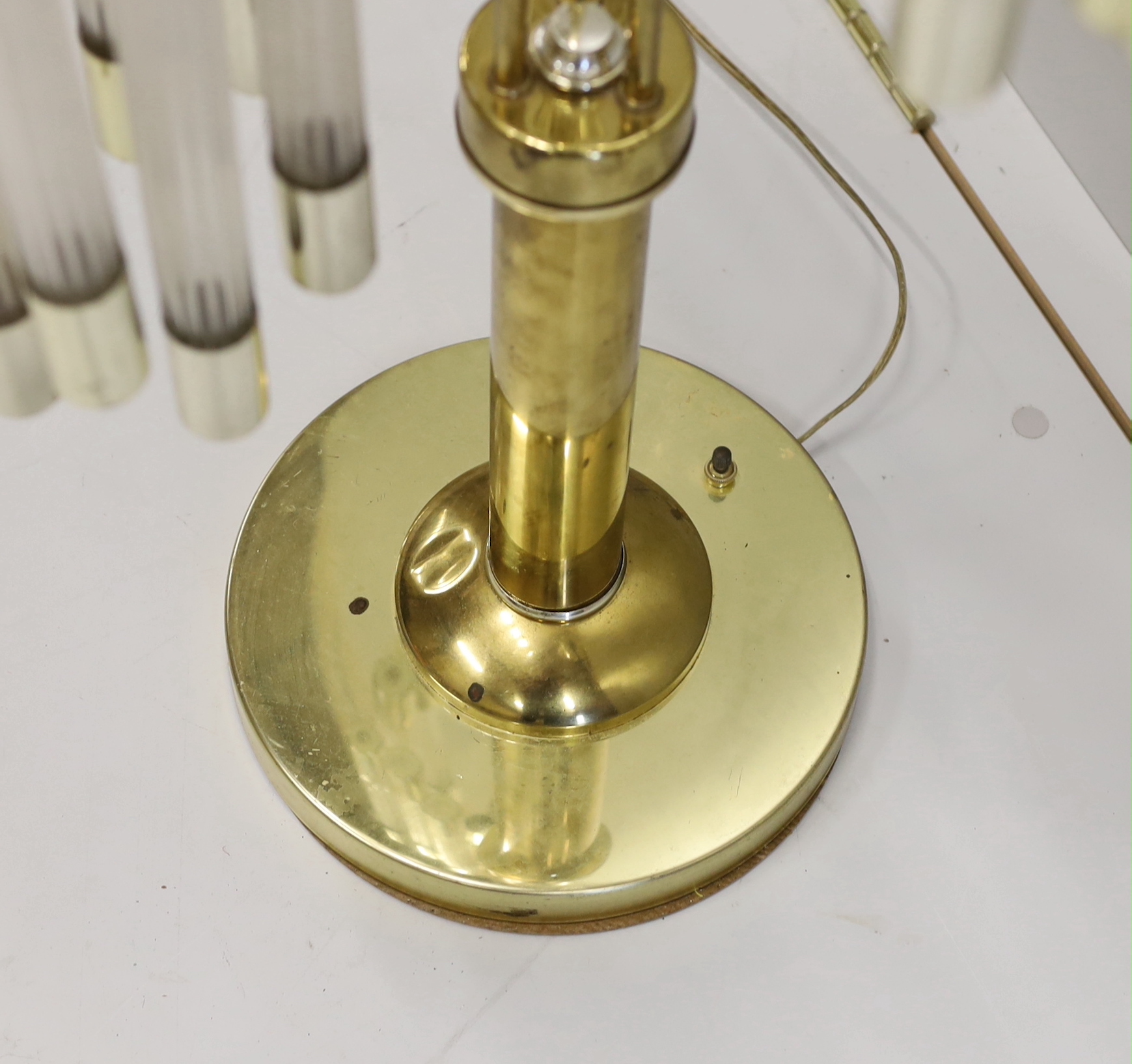 A contemporary brass and perspex three branch table lamp, height 91cm